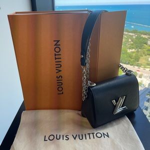 Louis Vuitton Twist PM in Epi black leather.
